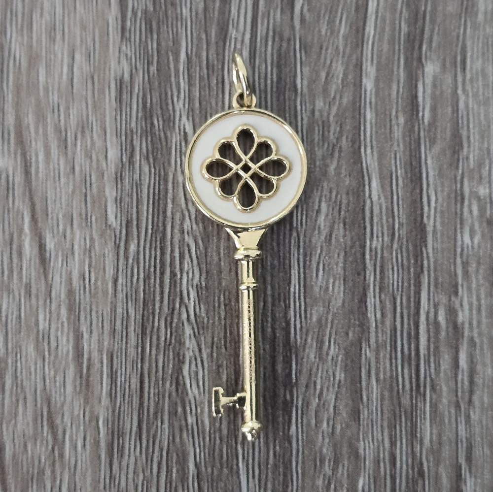 Gold and cream‎ enamel key pendant. Hard to find and rare!